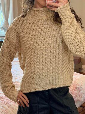 Beige mock neck knit sweater from Isalis